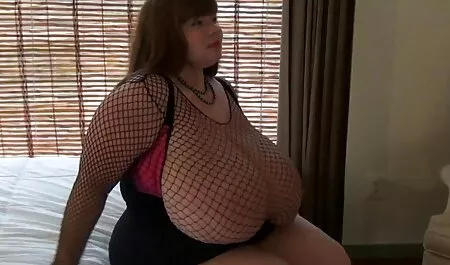 Bruna video amatori sex in un abito sexy e calze